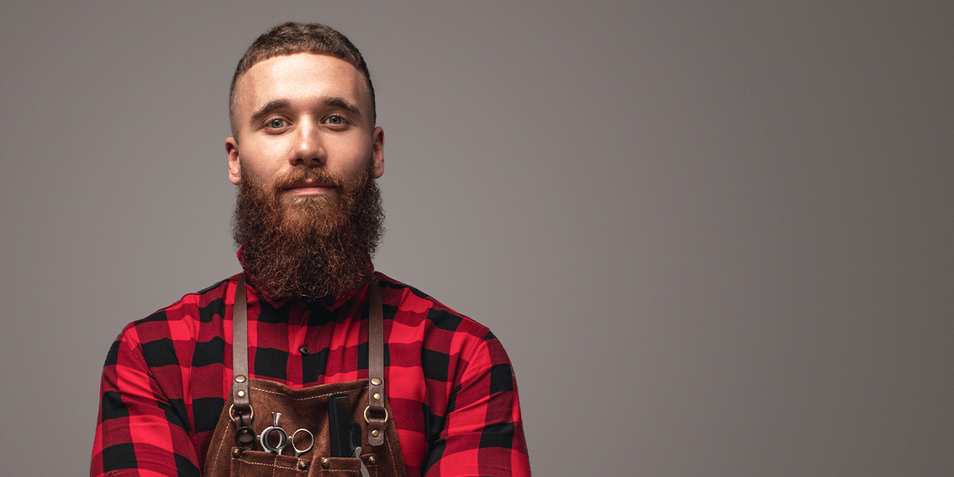 A man with a healthy, thick beard growth
