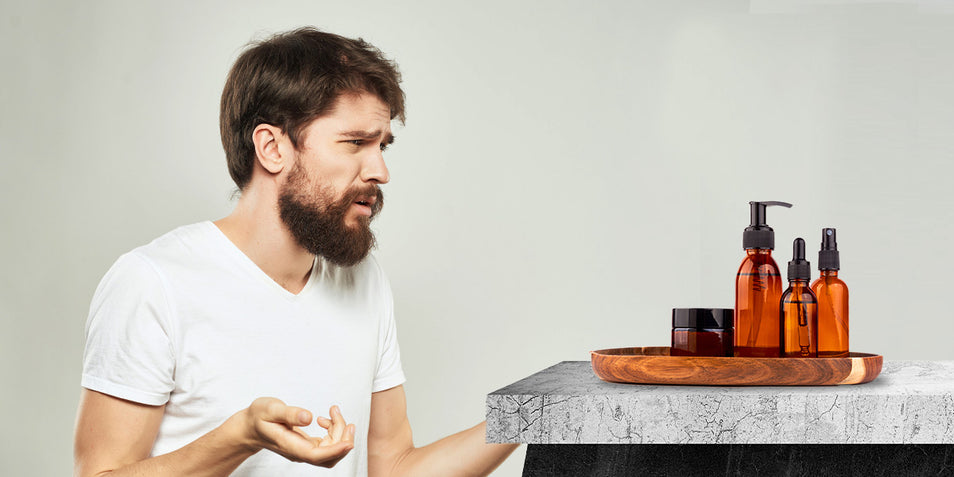 A man looking confused which beard product to use