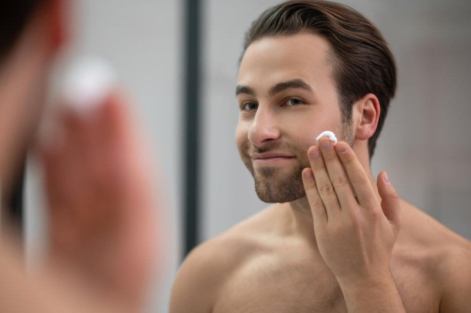 man applying beard butter to improve his beard growth